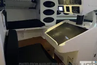 Interior of a 1999 Custom Murray Burns Dovell 62 yacht with navigation equipment.