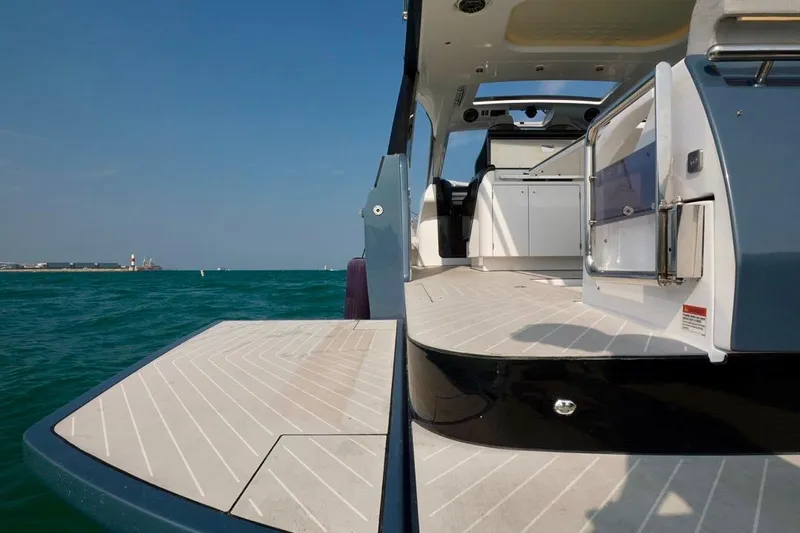  Yacht Photos Pics 2024 Azimut Verve 48 yacht, sleek deck design, open sea view.