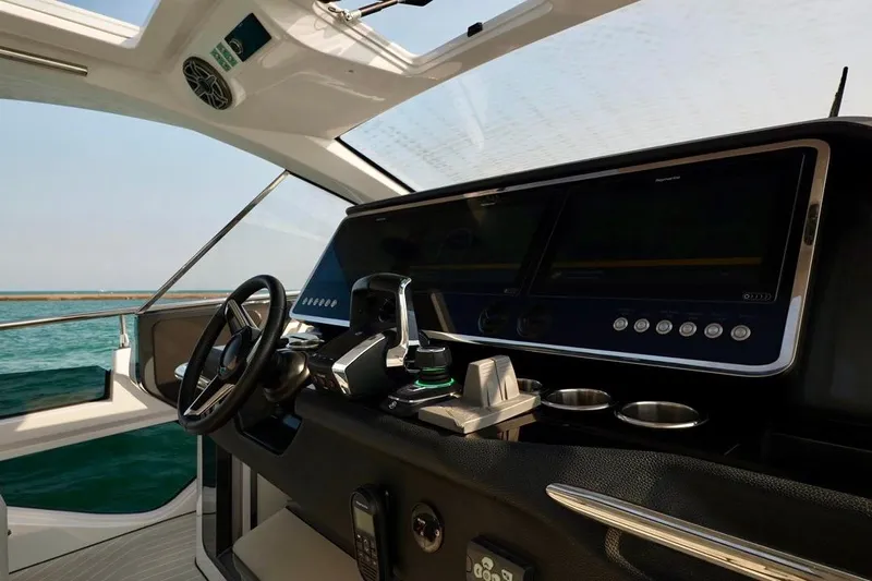  Yacht Photos Pics 2024 Azimut Verve 48 yacht cockpit with modern steering and navigation systems.