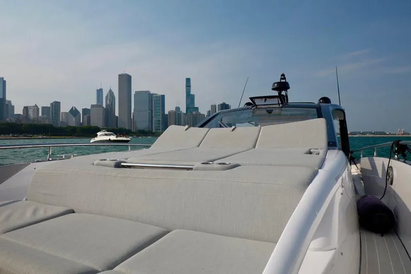  Yacht Photos Pics 2024 Azimut Verve 48 yacht with city skyline in the background.