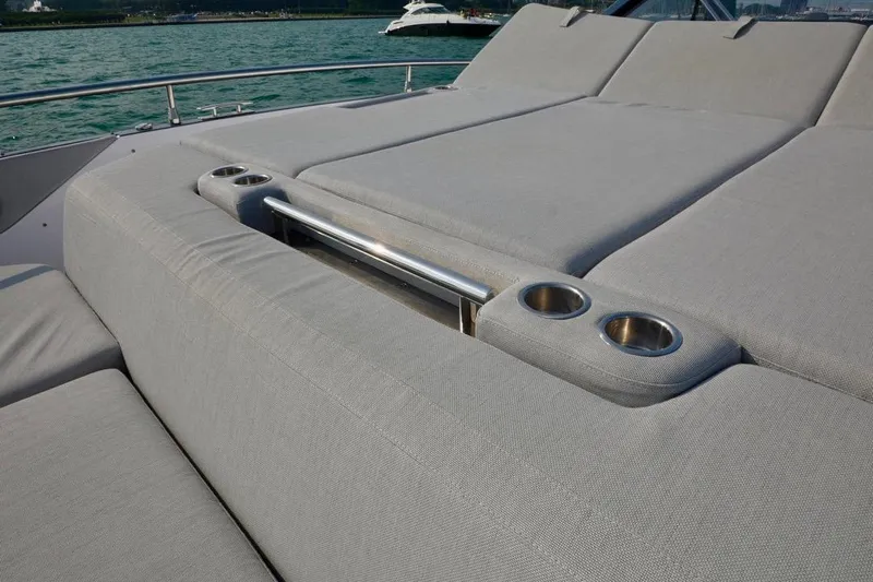  Yacht Photos Pics Luxurious sunbed with cup holders on 2024 Azimut Verve 48 yacht.