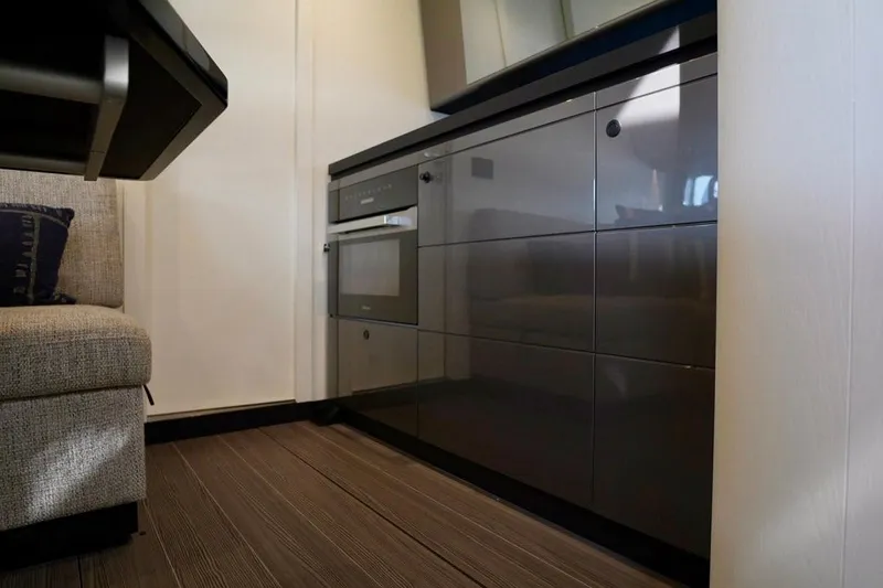  Yacht Photos Pics 2024 Azimut Verve 48 yacht interior with sleek cabinetry and modern design.