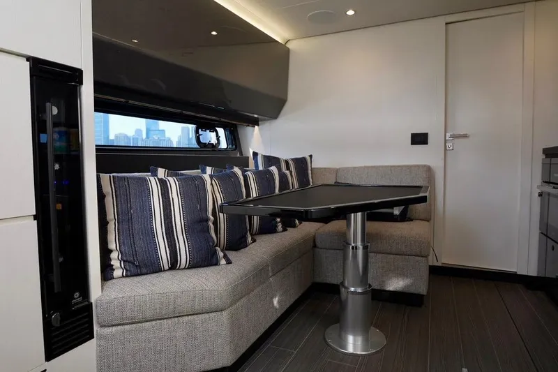  Yacht Photos Pics Interior of 2024 Azimut Verve 48 yacht with modern seating and table.