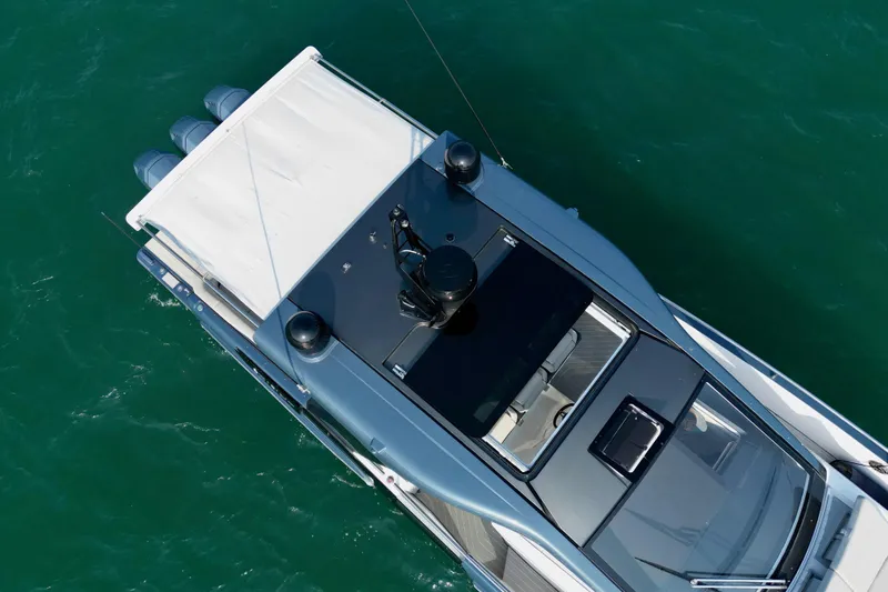  Yacht Photos Pics Aerial view of 2024 Azimut Verve 48 yacht on turquoise water.