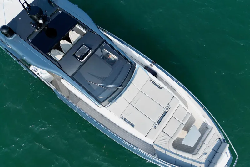  Yacht Photos Pics Top view of 2024 Azimut Verve 48 yacht on turquoise water.