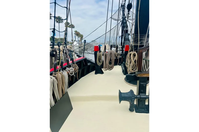 Devil's Gauntlet Yacht Photos Pics Deck view of a 1977 Custom Brigantine ship with ropes and rigging.