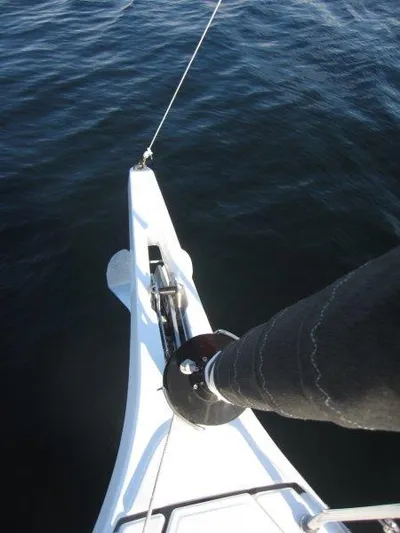  Yacht Photos Pics Bow of Jeanneau 380 sailboat, 2024 model, on calm water.