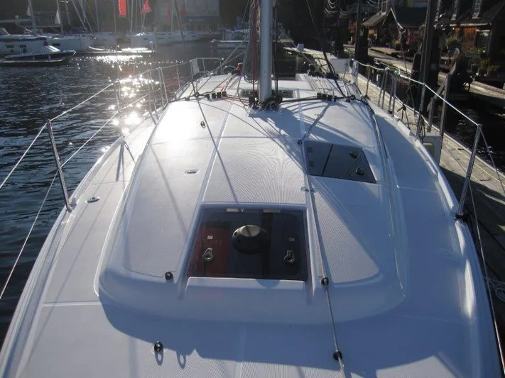  Yacht Photos Pics 2024 Jeanneau 380 sailboat deck at marina.