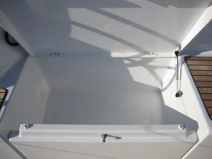  Yacht Photos Pics Open storage compartment on a 2024 Jeanneau 380 sailboat.