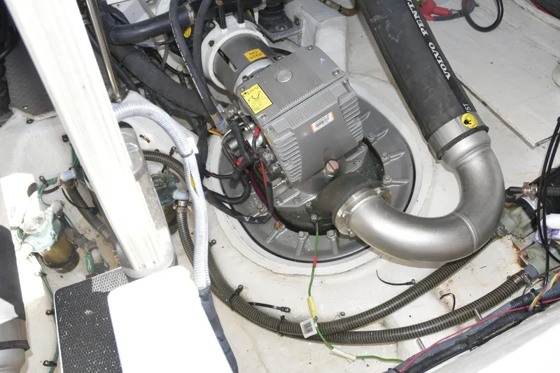  Yacht Photos Pics Engine compartment of a 2013 Regal 42 Sport Coupe, featuring mechanical components and wiring.