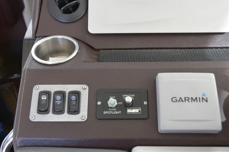  Yacht Photos Pics Control panel of a 2013 Regal 42 Sport Coupe with Garmin navigation system.