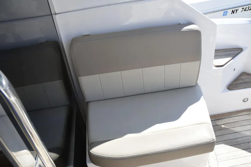  Yacht Photos Pics Gray cushioned seat on 2013 Regal 42 Sport Coupe yacht deck.