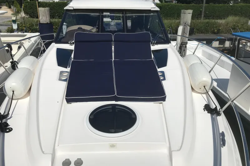  Yacht Photos Pics 2013 Regal 42 Sport Coupe yacht with sun loungers on deck.