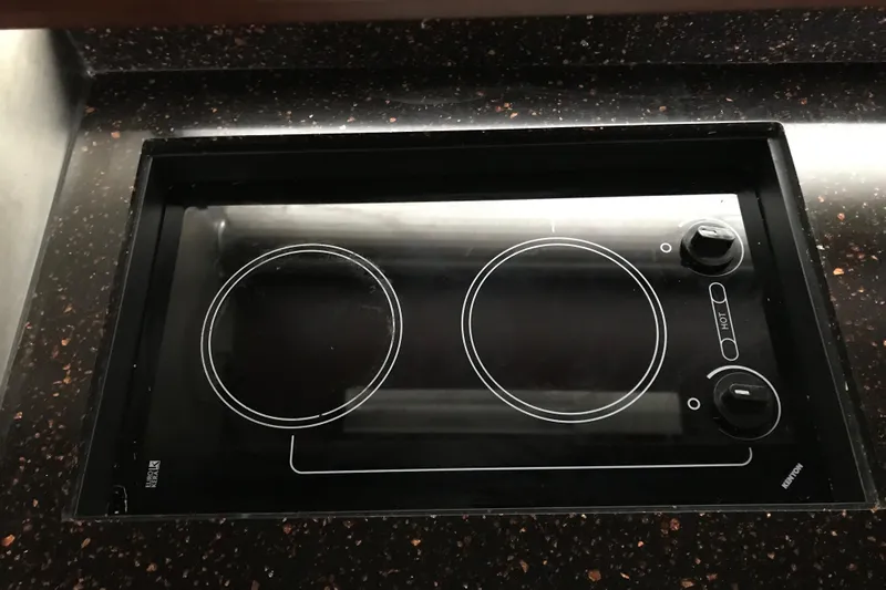  Yacht Photos Pics Built-in electric cooktop on 2013 Regal 42 Sport Coupe yacht kitchen.