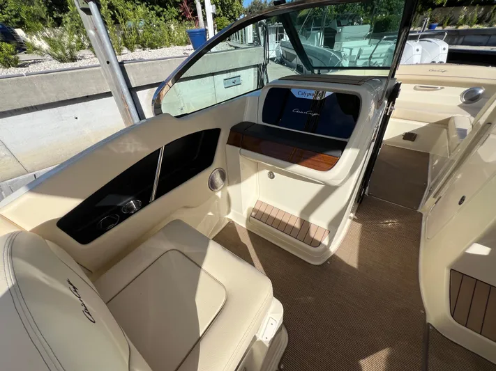  Yacht Photos Pics 2025 Chris-Craft Calypso 28 interior with elegant seating and modern design.