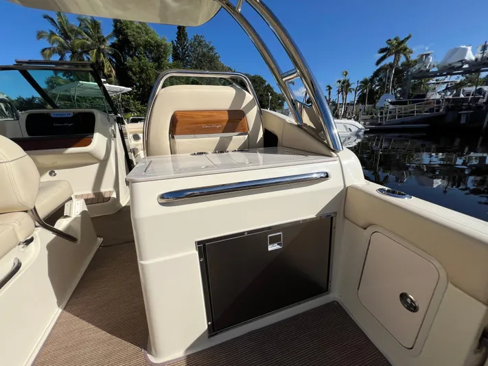  Yacht Photos Pics 2025 Chris-Craft Calypso 28 boat interior with luxurious seating and sleek design.