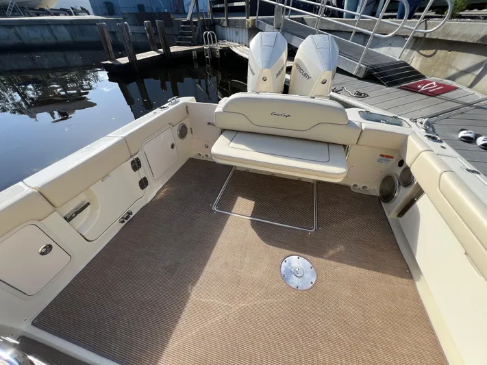  Yacht Photos Pics 2025 Chris-Craft Calypso 28 boat interior with seating and twin Mercury engines.