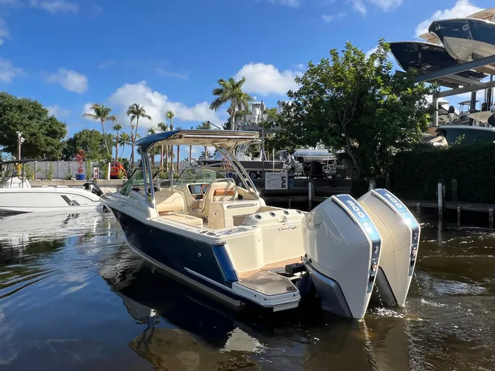  Yacht Photos Pics 2025 Chris-Craft Calypso 28 boat with dual Mercury engines on a sunny day.