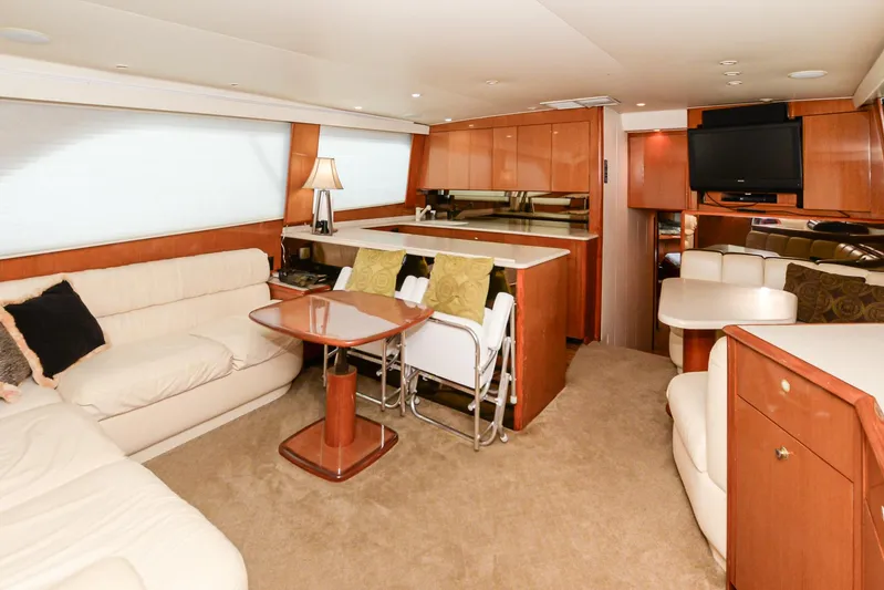 Sue-sea Yacht Photos Pics Luxurious interior of a 1999 Viking 55 Convertible yacht with elegant furnishings.