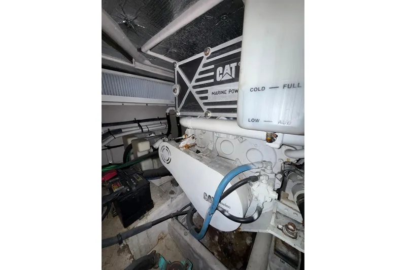 Gambit Yacht Photos Pics Engine room of 2001 Sea Ray 560 Sedan Bridge with CAT marine power components.