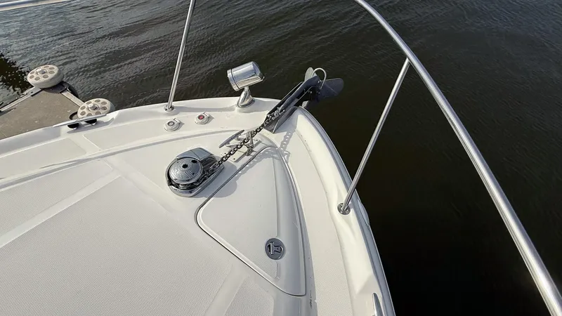  Yacht Photos Pics Bow of 2008 Sea Ray 340 Sundancer yacht with anchor and railing.