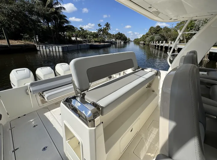  Yacht Photos Pics 2016 Boston Whaler 420 Outrage boat interior with scenic waterway view.