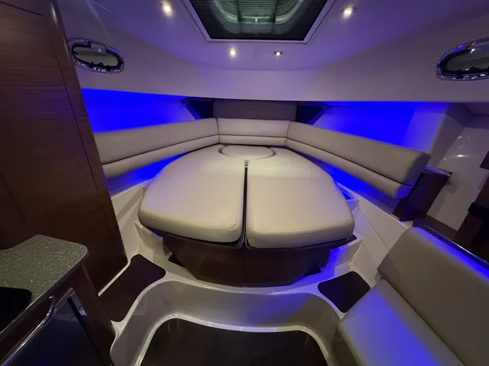  Yacht Photos Pics Luxurious interior of 2018 Boston Whaler 345 Conquest with ambient blue lighting.
