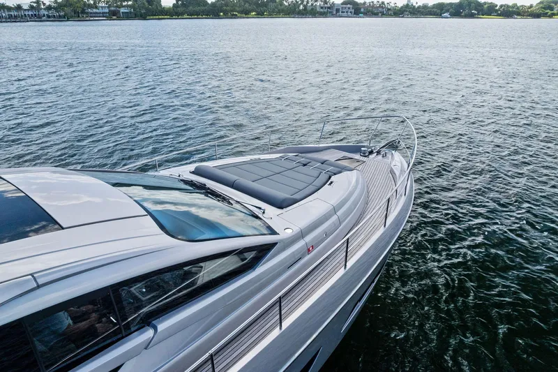 Niki Yacht Photos Pics 2024 Pershing 7X yacht on calm water, showcasing sleek design and luxury features.