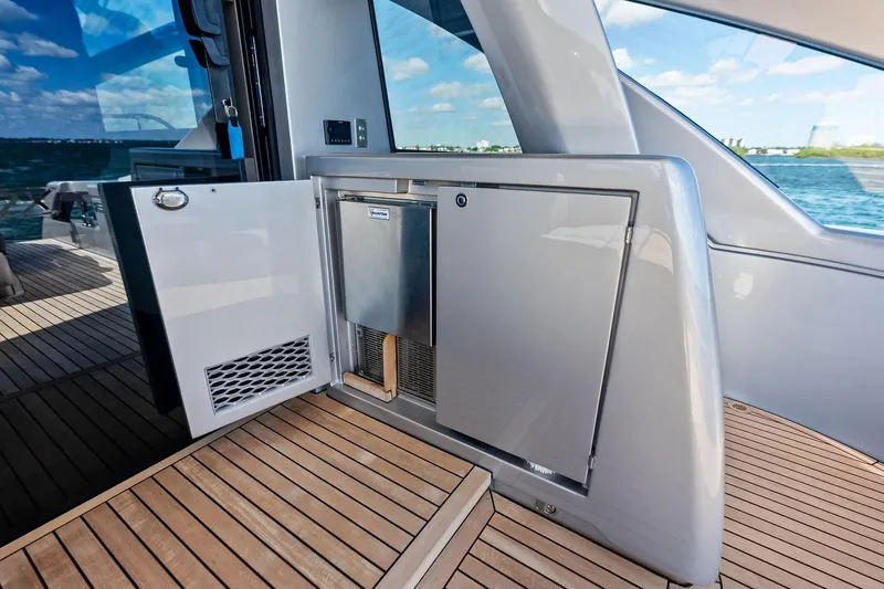 Niki Yacht Photos Pics 2024 Pershing 7X yacht deck with sleek cabinetry and ocean view.