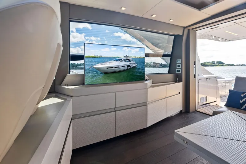 Niki Yacht Photos Pics Luxurious interior of 2024 Pershing 7X yacht with scenic ocean view.