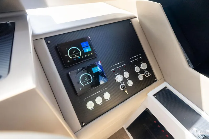 Niki Yacht Photos Pics Control panel of 2024 Pershing 7X yacht with digital displays and switches.