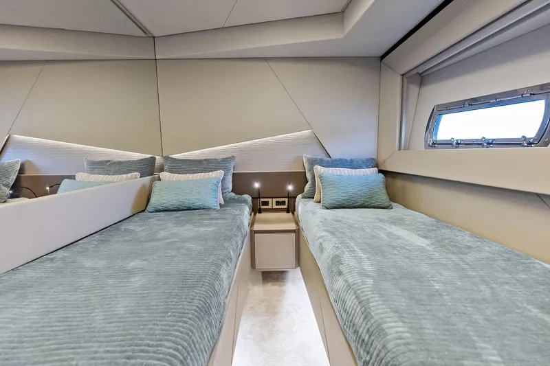 Niki Yacht Photos Pics Luxurious twin cabin interior of 2024 Pershing 7X yacht with modern design.