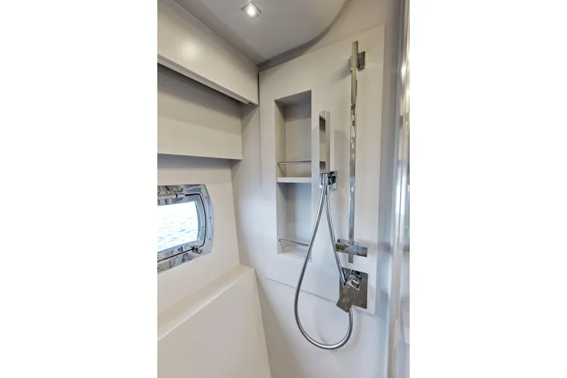 Niki Yacht Photos Pics Modern shower area in 2024 Pershing 7X yacht, featuring sleek design and chrome fixtures.