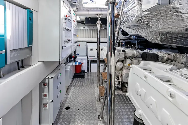 Niki Yacht Photos Pics Engine room of 2024 Pershing 7X yacht, featuring advanced machinery and control panels.