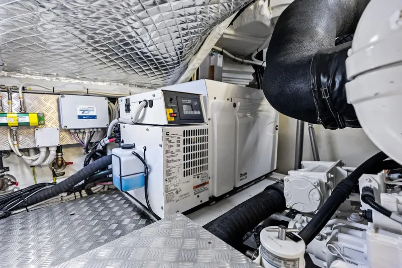 Niki Yacht Photos Pics Engine room of 2024 Pershing 7X yacht featuring advanced machinery and equipment.