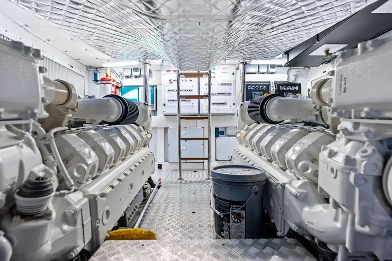 Niki Yacht Photos Pics Engine room of 2024 Pershing 7X yacht with dual engines and control panels.
