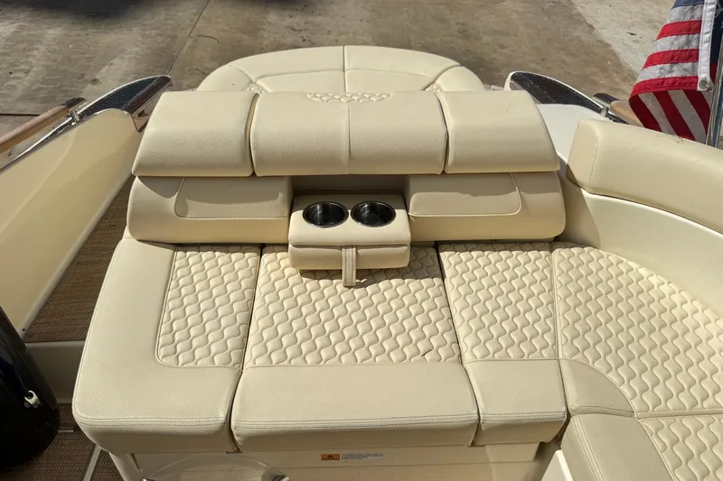  Yacht Photos Pics 2019 Chris-Craft Launch 28 GT boat with beige quilted seating and cup holders.