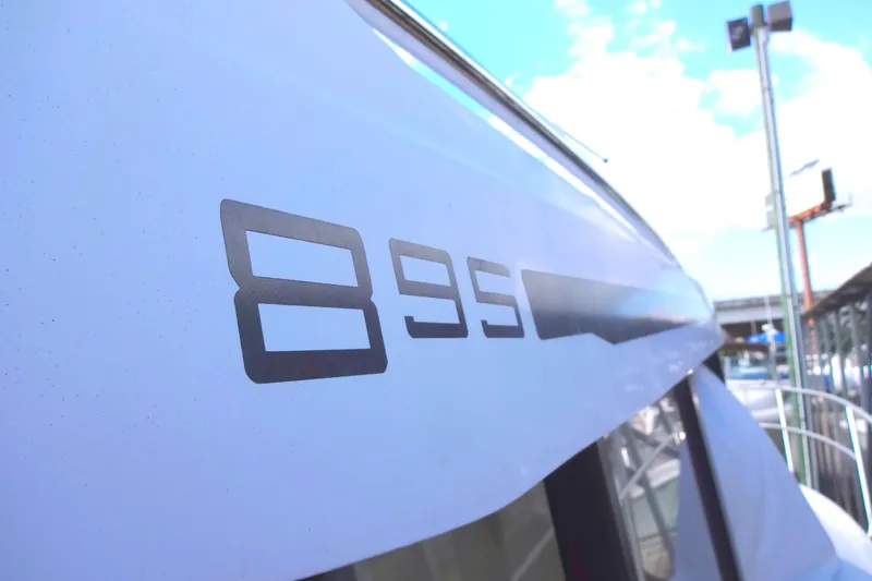 Blue Baby Yacht Photos Pics 2022 Jeanneau Merry Fisher 895 Offshore boat exterior with model number visible.