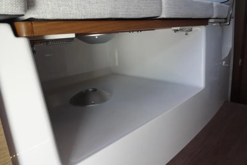 Blue Baby Yacht Photos Pics Interior storage space in 2022 Jeanneau Merry Fisher 895 Offshore boat.