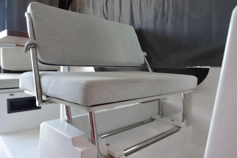 Blue Baby Yacht Photos Pics 2022 Jeanneau Merry Fisher 895 Offshore interior seating with modern design and comfortable upholstery.