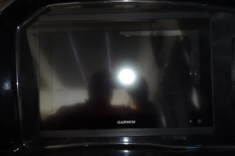 Blue Baby Yacht Photos Pics Garmin display screen on 2022 Jeanneau Merry Fisher 895 Offshore boat dashboard.