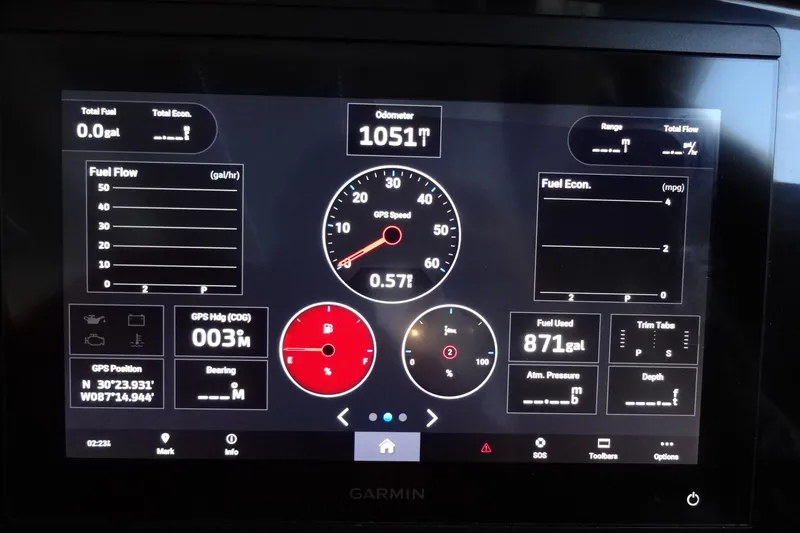 Blue Baby Yacht Photos Pics Garmin marine display on 2022 Jeanneau Merry Fisher 895 Offshore showing fuel and navigation data.