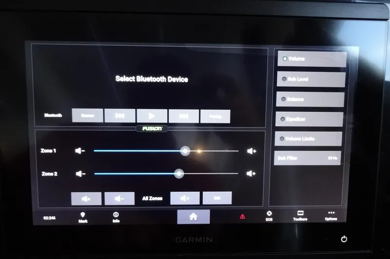 Blue Baby Yacht Photos Pics Control panel of 2022 Jeanneau Merry Fisher 895 Offshore, featuring Bluetooth and audio settings.