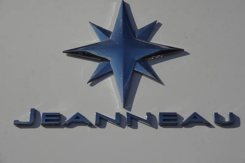 Blue Baby Yacht Photos Pics Jeanneau logo on Merry Fisher 895 Offshore, 2022 model boat.