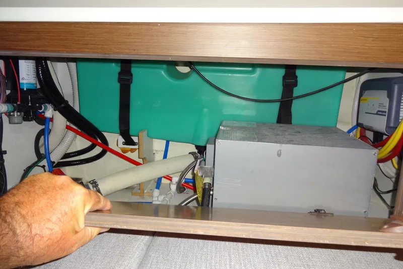 Blue Baby Yacht Photos Pics Interior view of 2022 Jeanneau Merry Fisher 895 Offshore boat's engine compartment.