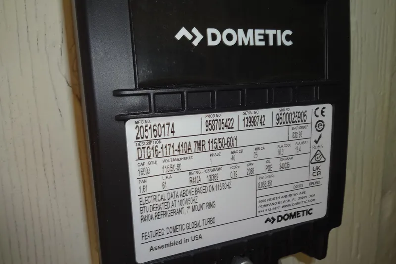 Blue Baby Yacht Photos Pics Dometic device label with specifications, including model DTG16-4171-410A, R410A refrigerant, and electrical data.