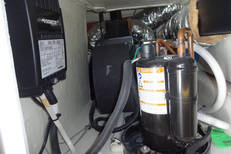 Blue Baby Yacht Photos Pics Engine compartment of 2022 Jeanneau Merry Fisher 895 Offshore boat.