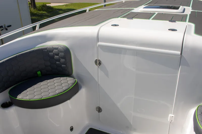 Adeline Yacht Photos Pics 2023 Glasstream 328 GS Xtreme boat interior with cushioned seating and sleek design.