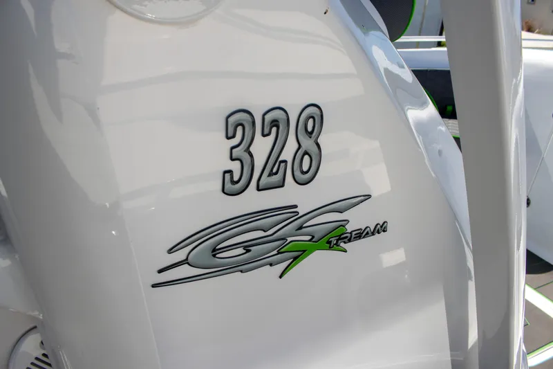 Adeline Yacht Photos Pics 2023 Glasstream 328 GS Xtreme boat logo on white surface.