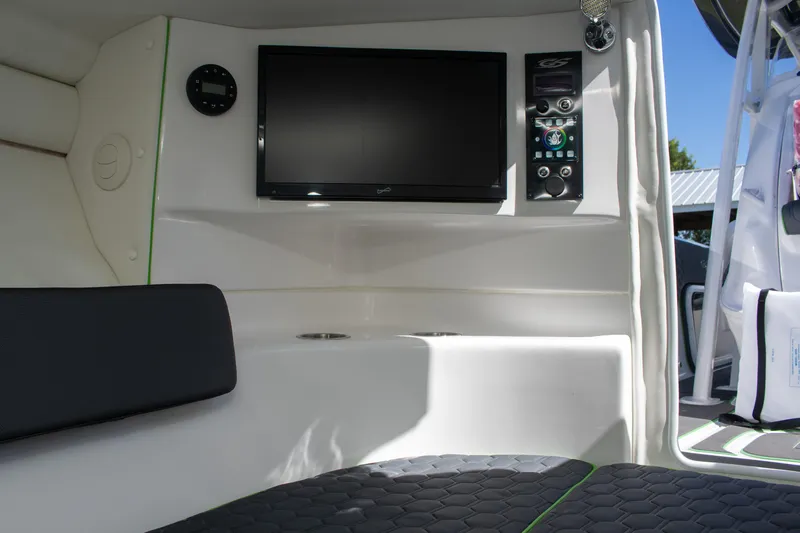 Adeline Yacht Photos Pics 2023 Glasstream 328 GS Xtreme interior with TV and control panel.